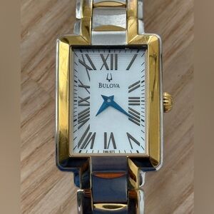 Bulova Curvex Luxury Watch Two-Tone Bracelet White Rectangular Dial Blue Hands